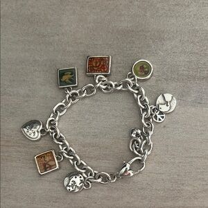Charming Silver Bracelet with Artistic Accents